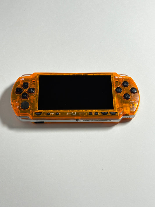 PSP 2000 - Transparent orange w black buttons