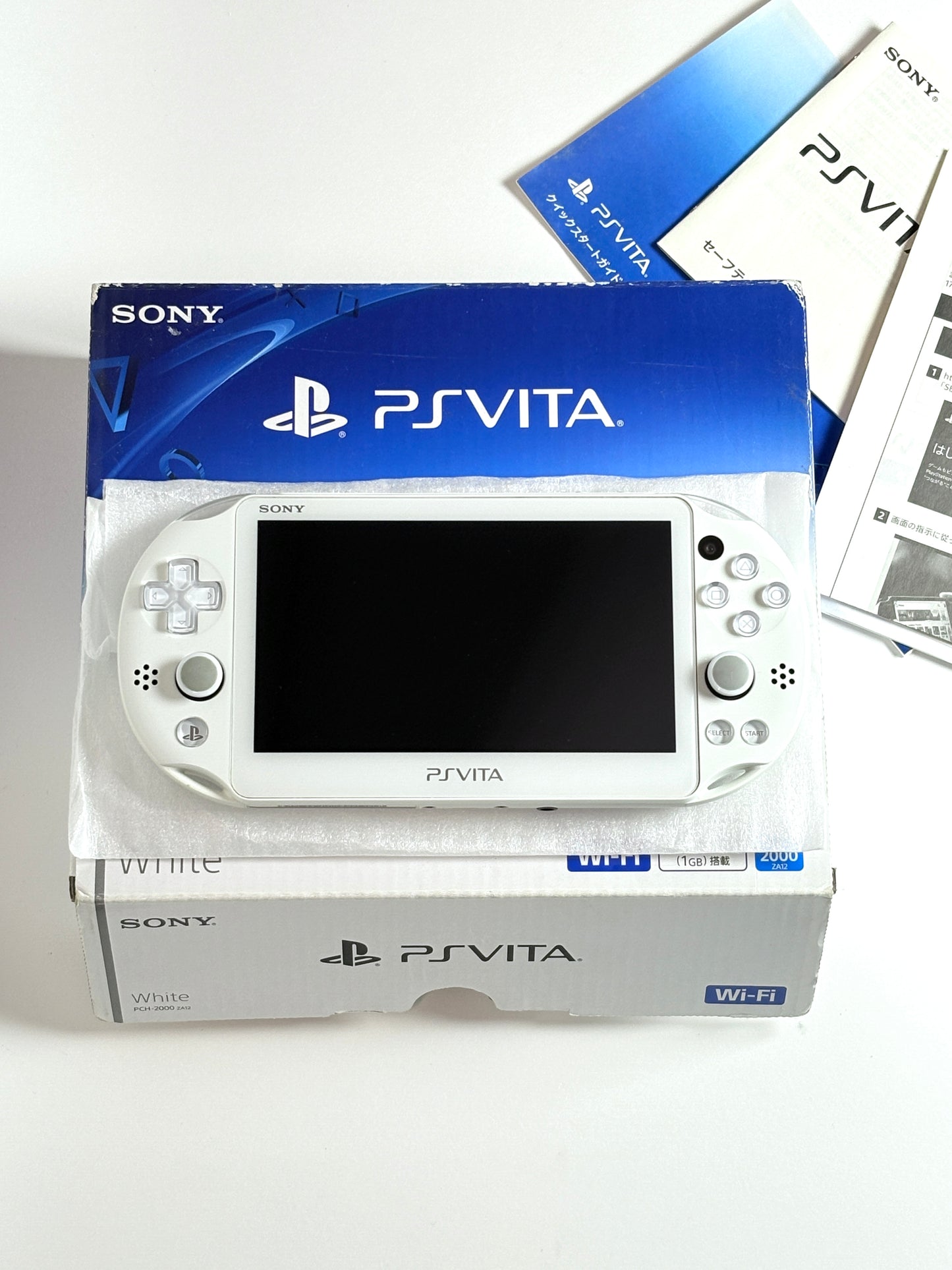 Ps Vita 2000 - White w Original box and acessories