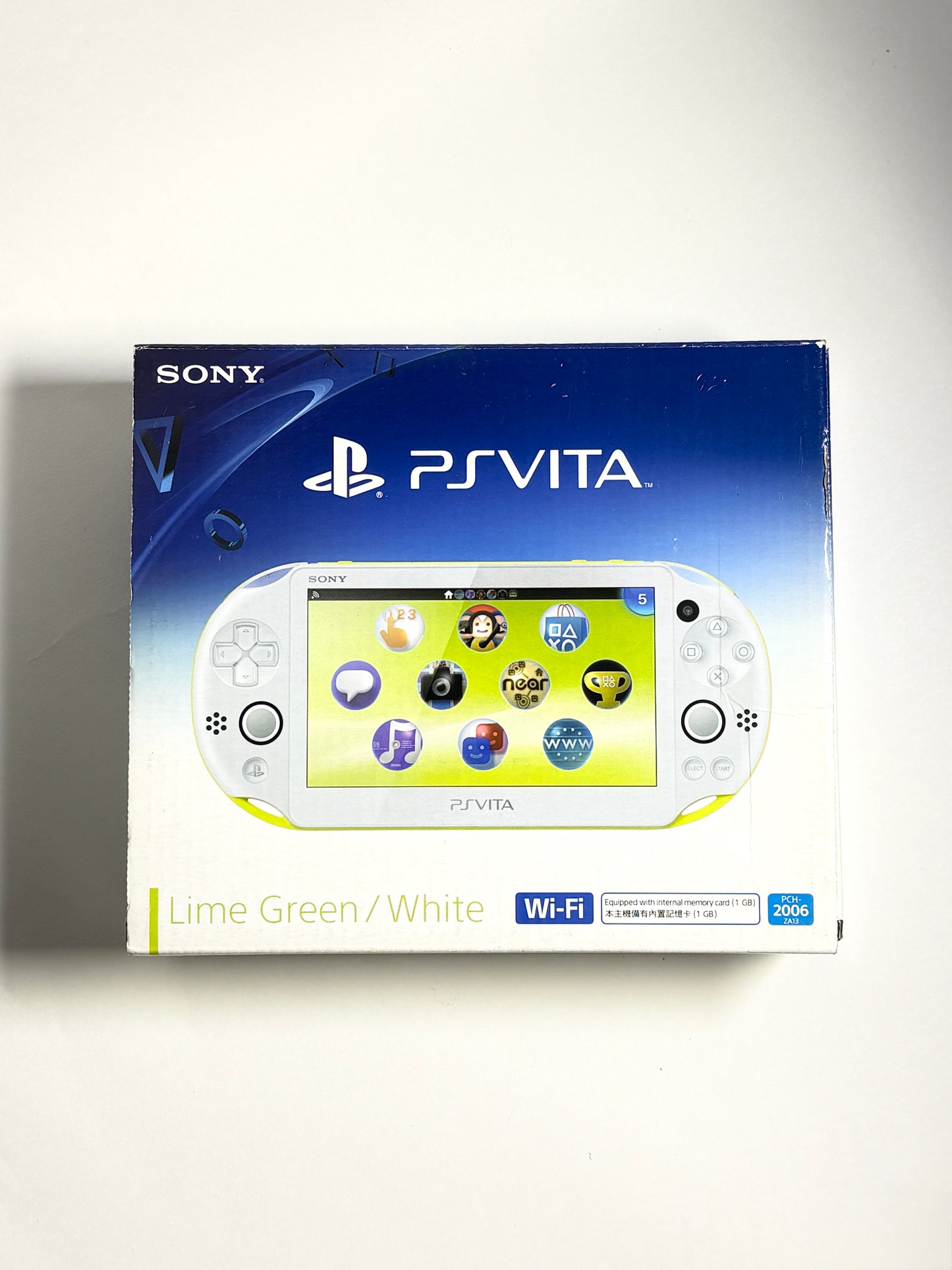 Ps Vita 2000 - Lime Green w Original box and acessories