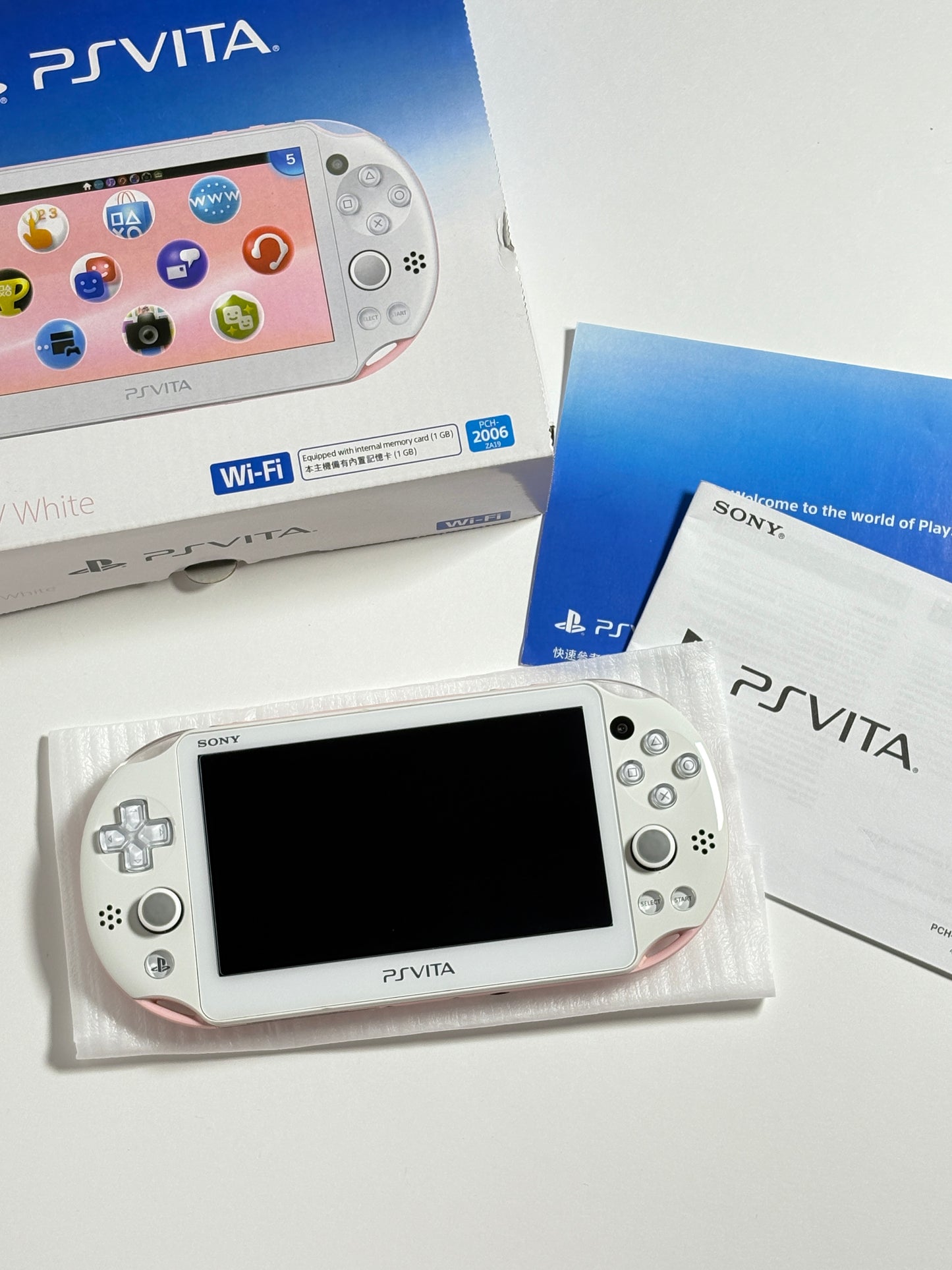 Ps Vita 2000 - Pink and White w original box